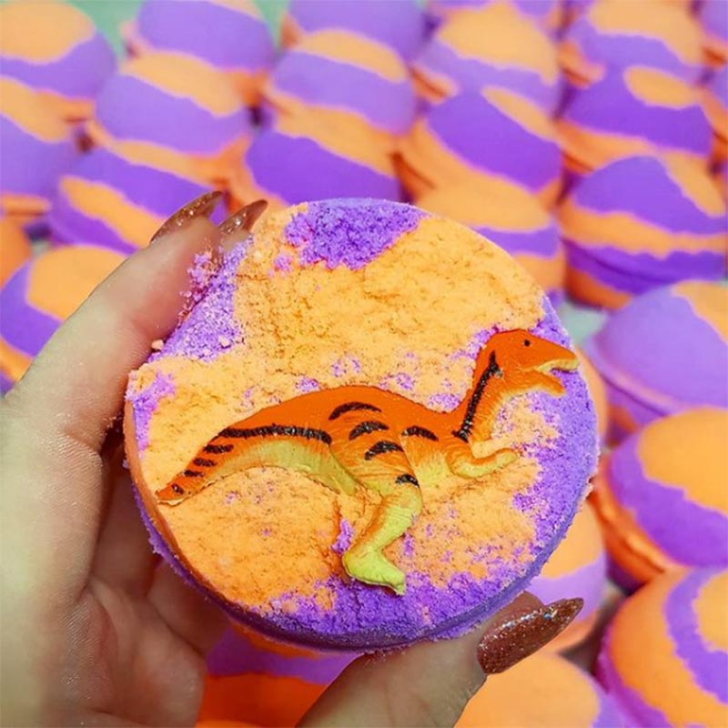 Bath Bombs Fun Kids Children’s Gifts Relaxing Stress Less Indulgent Therapeutic Muscle Relaxing Self Care Hidden Rainbow Toy Surprise Crystal Floral Botanical Dreamy Zesty Fruity Essential Oil Moisturising Hot Mess Body Bath Shower Skin Hair Products Skincare Vegan Cruelty Free Handmade Australia Shellharbour Wollongong Sydney Kiama Gerringong Milton NSW South Coast Afterpay Sensitive Skin Friendly Dino Toy Dinosaur Grape Bubblegum Purple Orange Trending alternate view